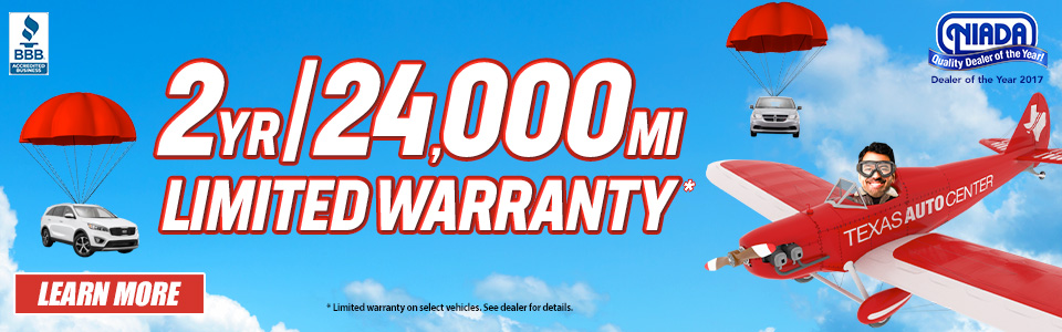 Man flying through the sky in an airplane with 2 Year 24,000 Mile Warranty written in the sky.