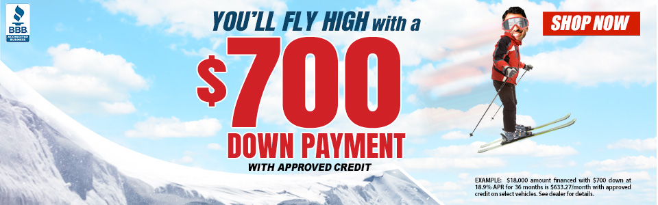 Man flying through the sky on skis and displaying information about low prices with 700 down. Down payments starting at $700. Shop now.